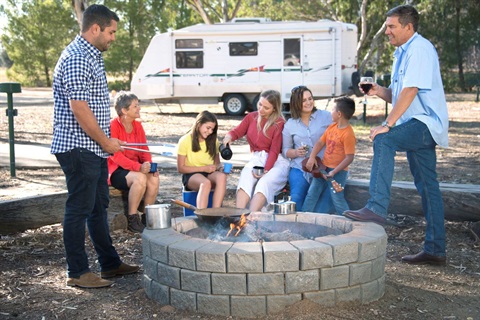 Urana Caravan Park Family around campfire